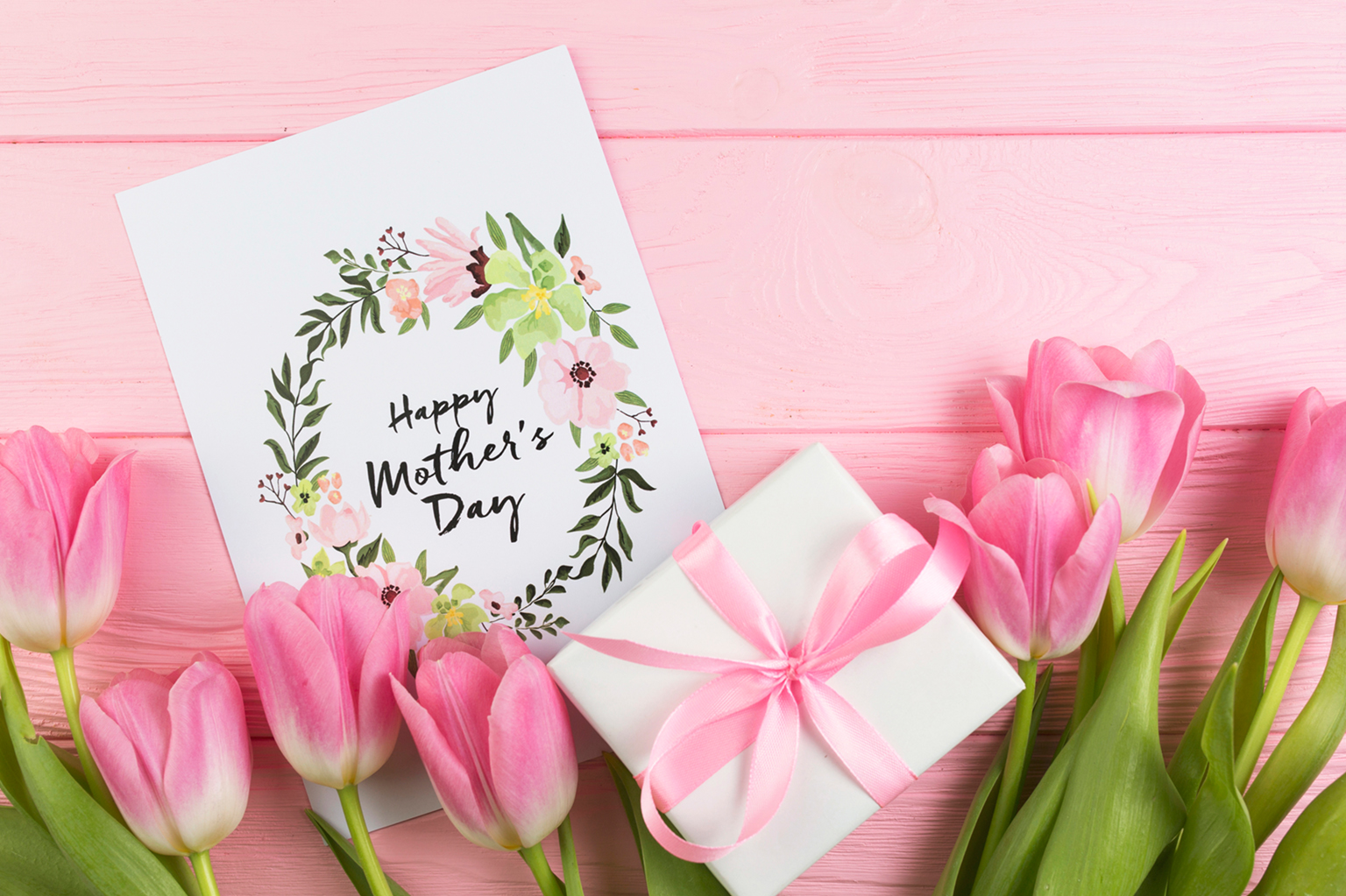Mother's Day gift ideas for her including spa sets, kitchen tools and jewelry flatlay