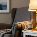 Cozy living room with warm home lighting ideas including floor lamp and smart lights