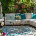 outdoor patio decor ideas with rattan furniture hanging chair and planters