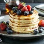 easy pancake recipes stack of fluffy oat and crepe pancakes on breakfast table