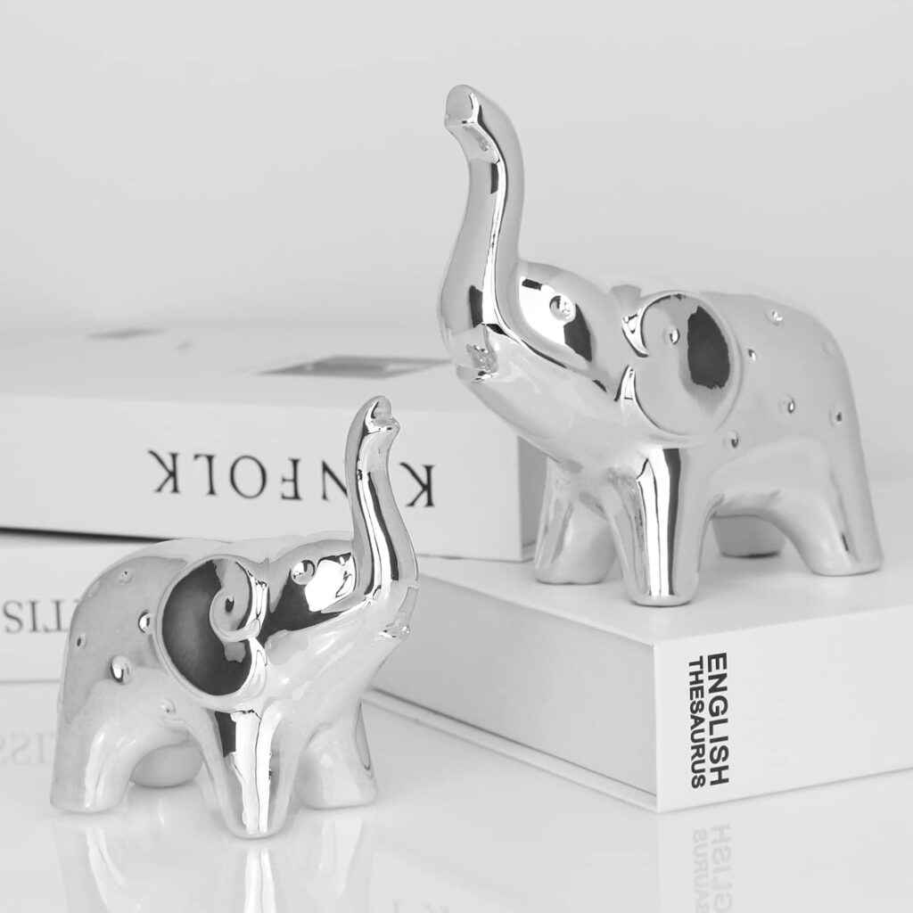 Pair of elephant statues in modern silver sculptural figurines for bookshelf or office desk