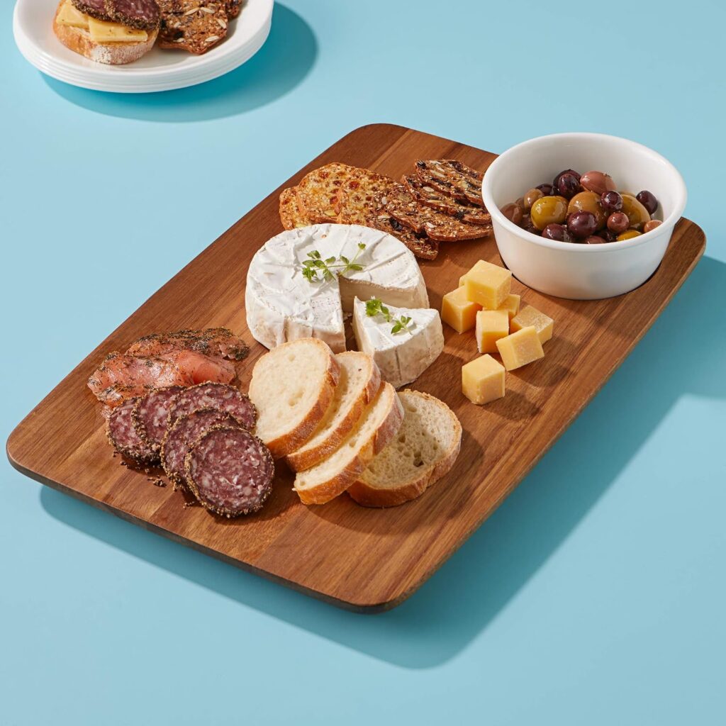 cutting board with delicious bites on it