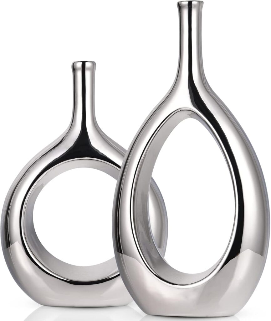 Glossy silver ceramic vase with hollow ellipse design for fireplace mantle or bookshelf
