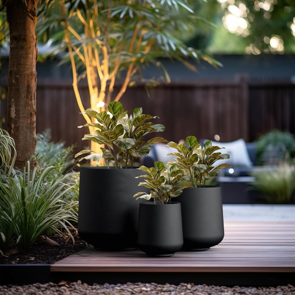 Kante set of 3 black concrete curved round planters for indoor staircase