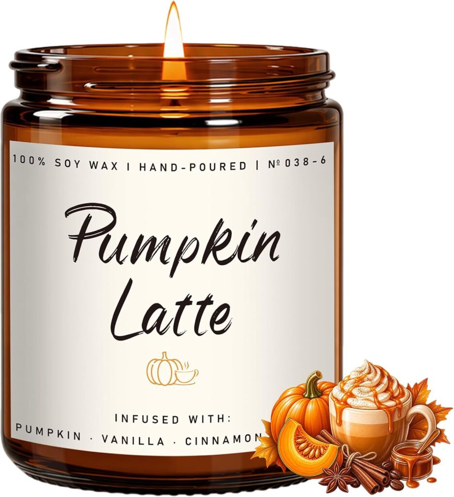 Pumpkin latte scented soy candle for autumn aromatherapy in cozy bathroom